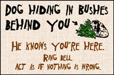Doormat Dog in Bushes