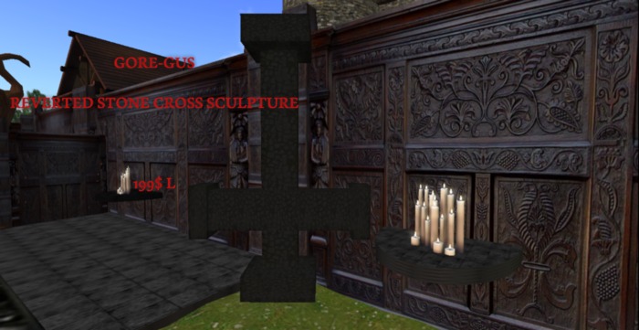REVERTED CROSS STATUE