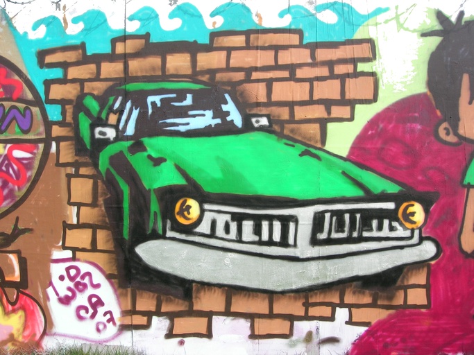Fence Grafitti Car
