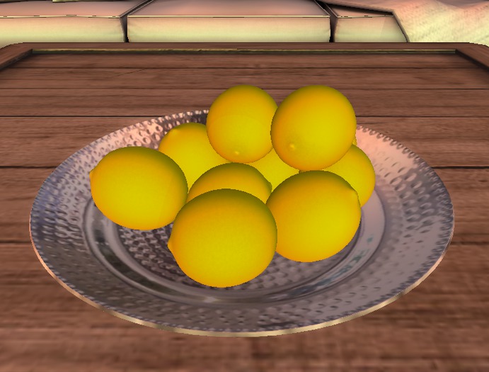 Lemons on Silver Plate