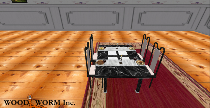 A bountiful black & red marble dining table with four dining chairs 