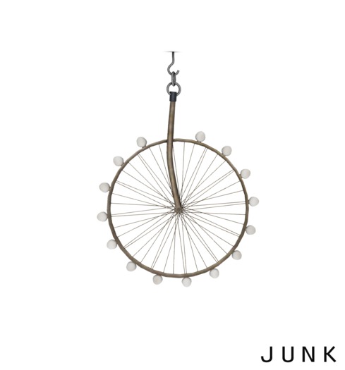 junk. repurposed wheel table. iron.