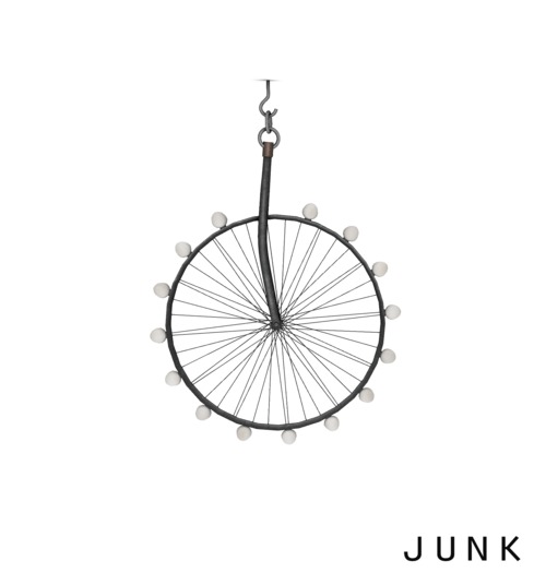 junk. repurposed wheel table. iron.
