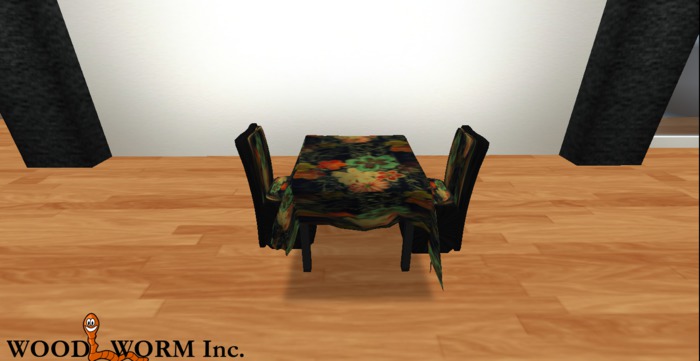Dining table with props and two chairs