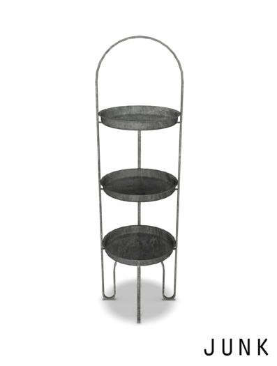 junk. industrial plant stand. dark.