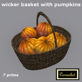 Wicker basket with pumpkins