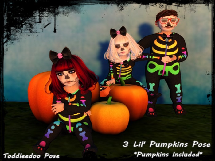3 Lil pumpkins pose