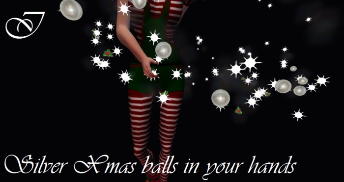 petite Silver Xmas balls in your hands