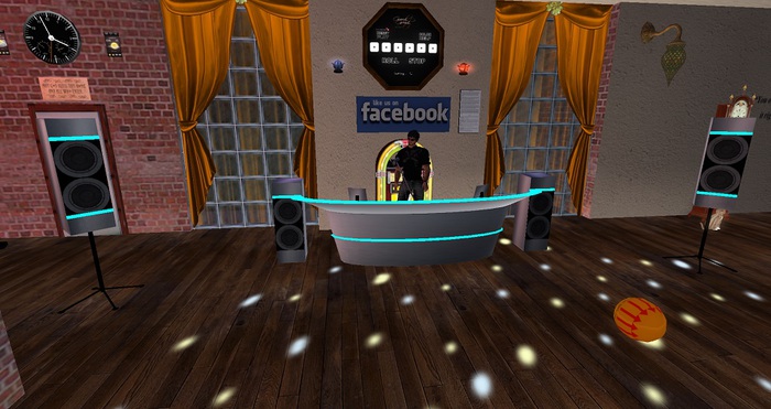 DJ-Booth With Subwoofers and Microphone