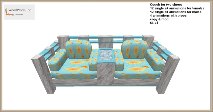 A modern couch with light blue cushions