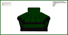 A cozy black armchair with green cushions. Only 2 prims