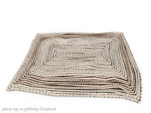 dust bunny . braided rug . boxed