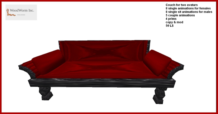Marble Couch with a red fabric cover and two pillows 