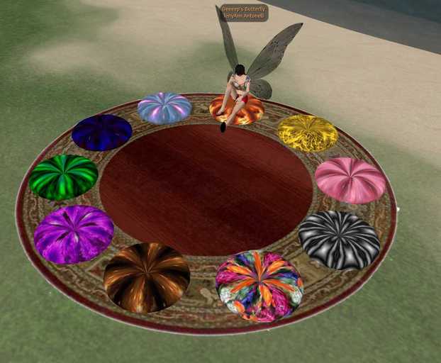 Round Rug with Different Pillow Poses - 11 Prims