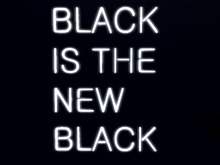 BLACK IS THE NEW BLACK glowing neon sign