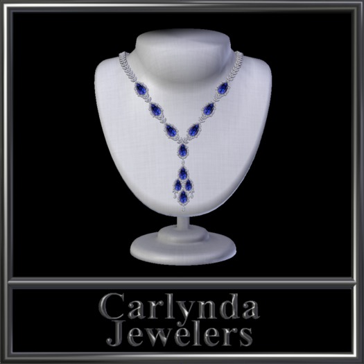 platinum emerald necklace and earrings