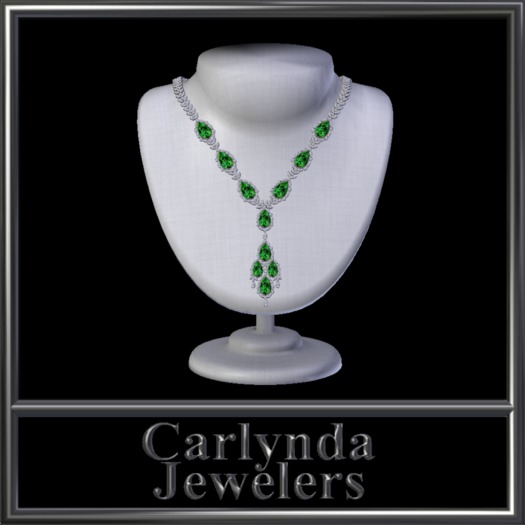 platinum emerald necklace and earrings