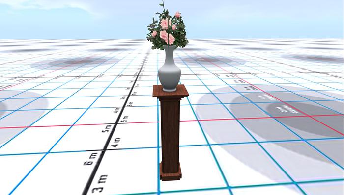 VASE OFF PINK ROSES ON A PLINTH