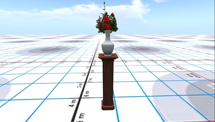 VASE OFF RED ROSES ON A PLINTH