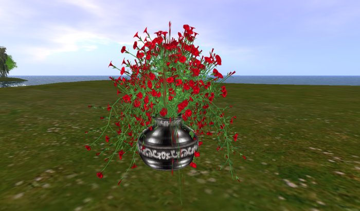 Scarlet Petunia in a Black Ornate Pot
