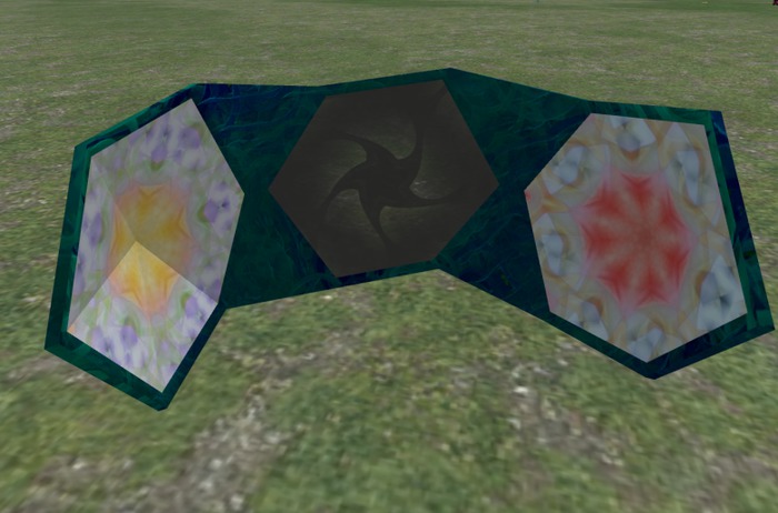 curved object with 3 hexagonal displays