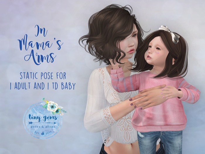 {tg.} - in mama's arms.  (boxed)