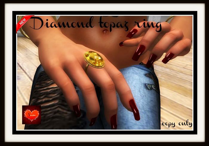 Diamond topaz ring *
