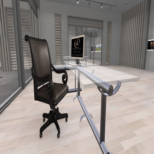 Office desk with chair and computer