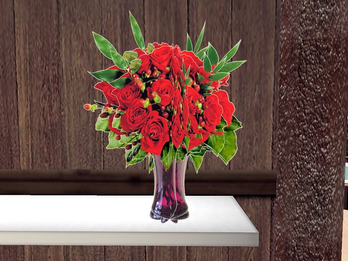 Red long stem Roses in a glass vase