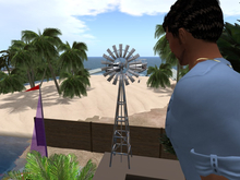 TM Small Metal Windmill - Touch blades to change speed