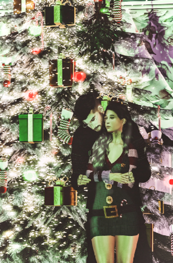 Carthage "X marks the spot"  Couple cuddle mistletoe