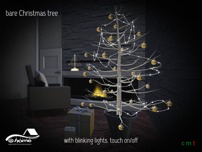 @home: bare Christmas tree with baubles and lights 