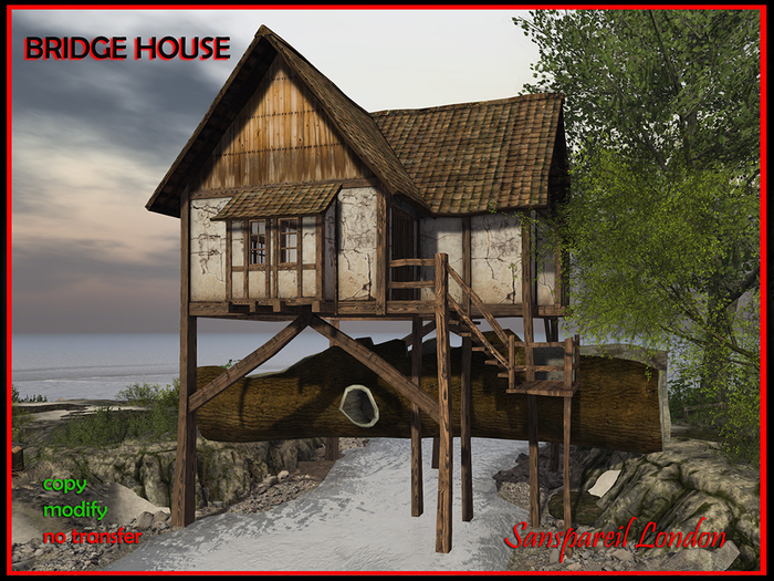 Log House 40 Boxed.  Half Timbered cottage on a log bridge. 