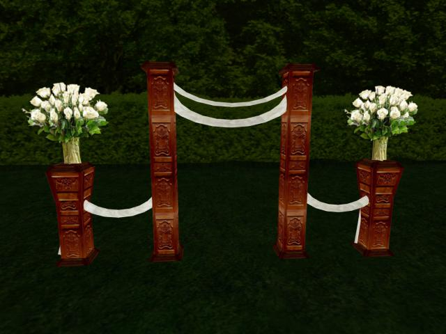 set of wooden columns and white flowers
