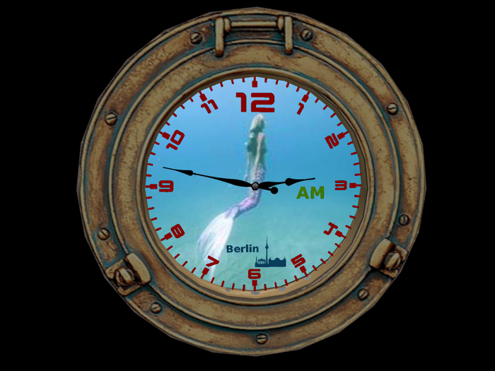 swimming mermaid clock