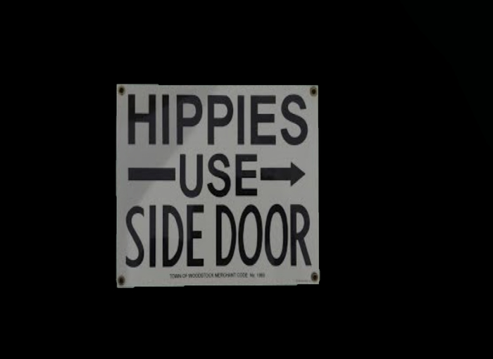 Hippies use side door sign