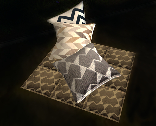 Three Pillows on a Quilt