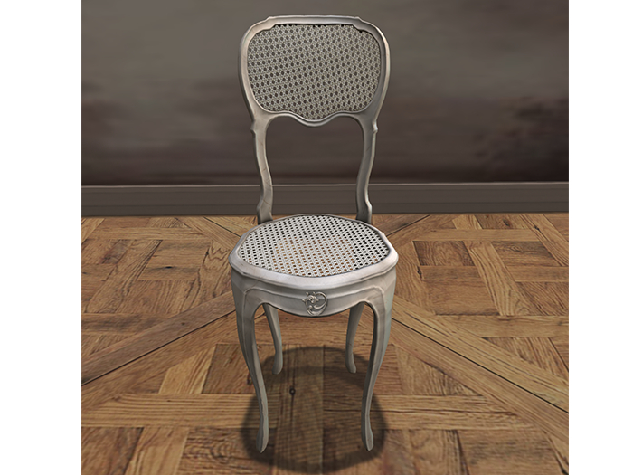 cane chair with ornament