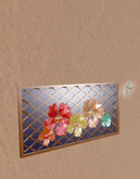 Violets on a gold-plated metal grill 