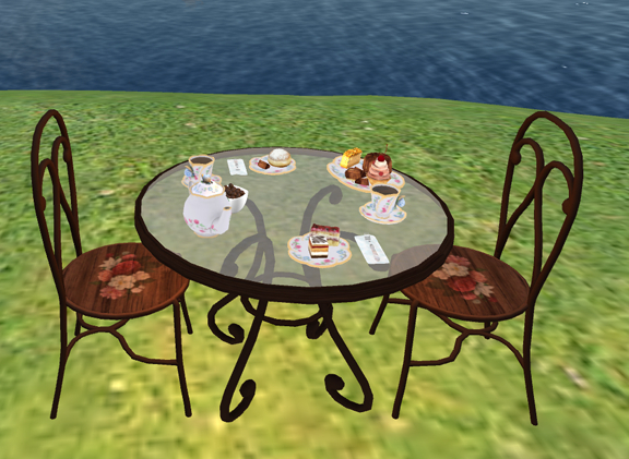 Garden Table with Tea Time Set and Yummy Sweets
