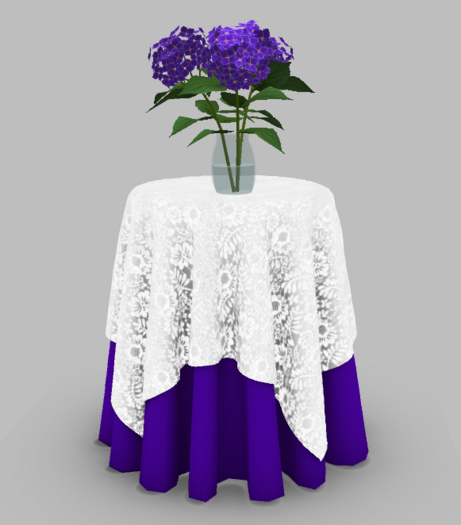 Table with Lace and Purple Tablecloth and Hydrangea Flowers