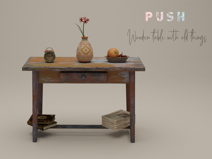 Push. wooden table with old things