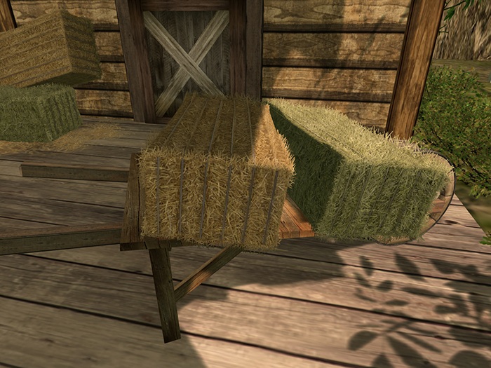 >VAL< Barrow with bales