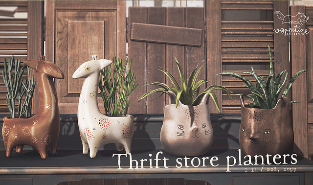 {vespertine}-thrift store giraffe planters