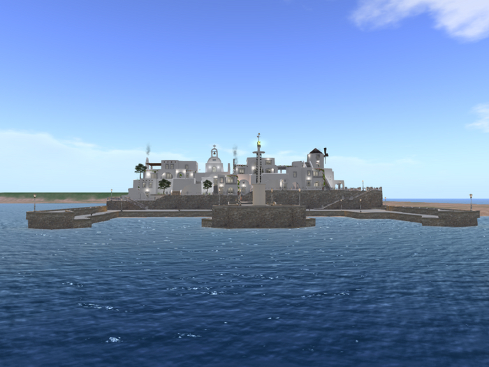 Greek island village with jetty