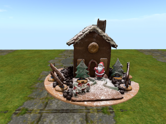 22 gingerbread house with santa and birds