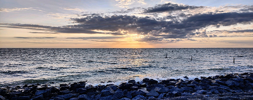 Sea with rocks land divider
