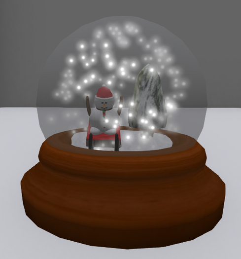 Snowman on Sled Snowglobe