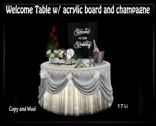 Welcome Table with champagne and acrylic board