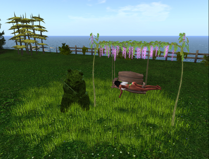 A swing and grass panda